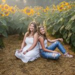 Sisters in a sunflower field